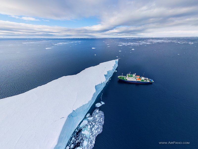 Polar Pioneer and iceberg