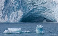 Icebergs and Ice cave waterfall. Austfonna Ice Cap, Nordaustlandet Island