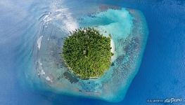 Над островком Munandhoo Над островком Munandhoo