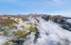 Clouds from the ocean above Valley of Geysers